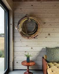vintage lasso ropes on a wall in a western styled room.