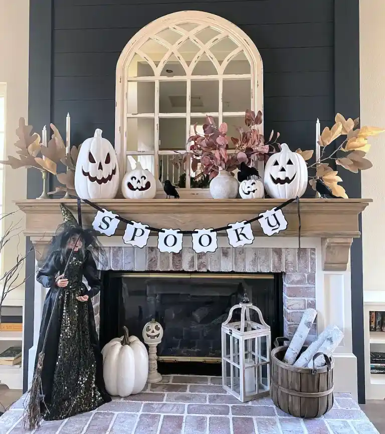 Small apartment statement Halloween decorating in one area (mantel decor) to save space. and avoid clutter.
