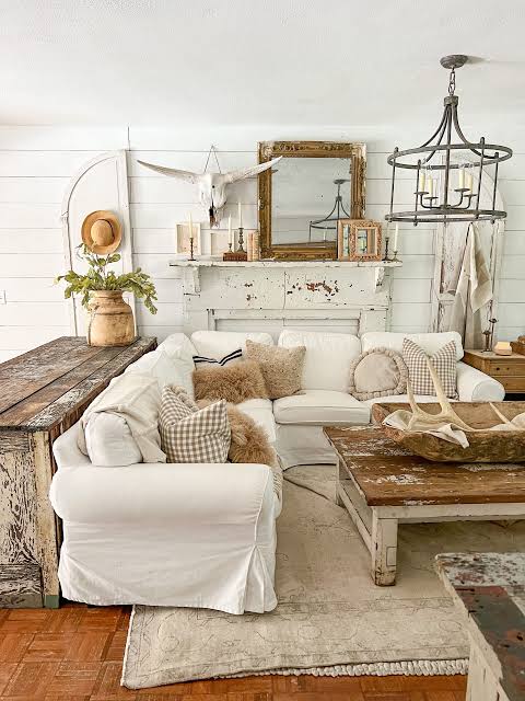 Living room with wood, stone, leather and metal accents.