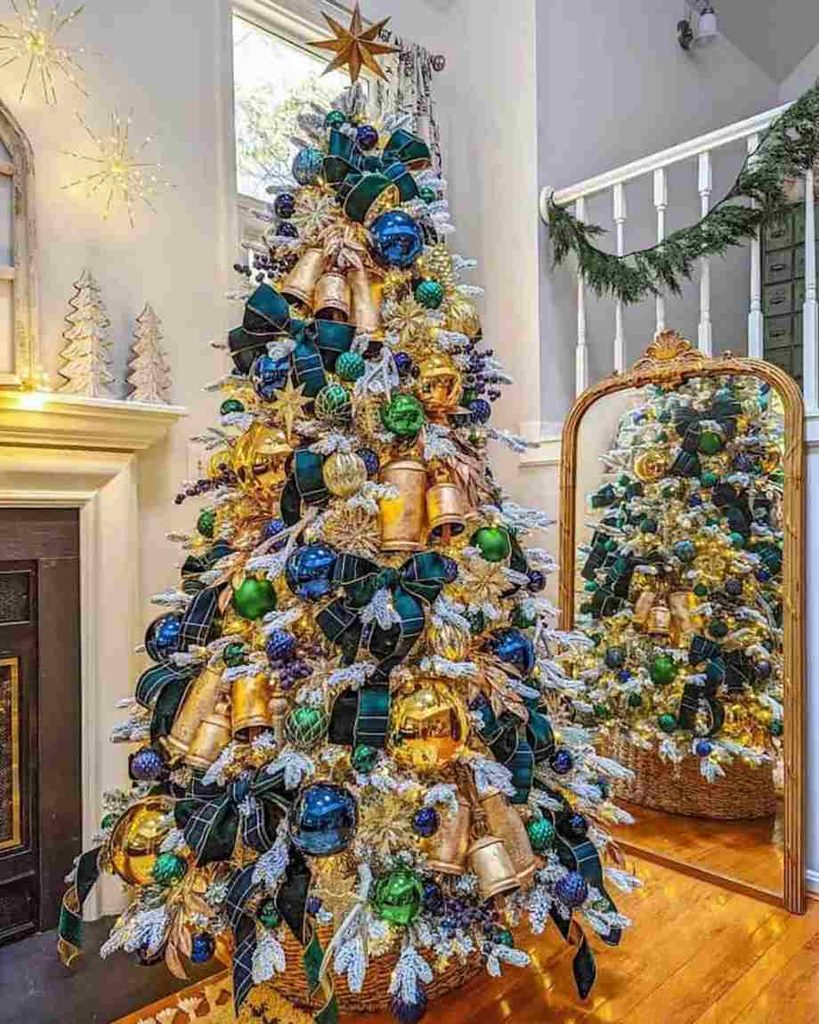 Christmas tree decorated with Blue tartan ribbons with brass bells.