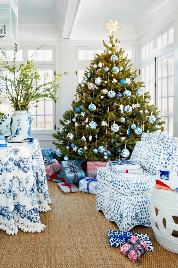 Coastal Christmas tree decorated with blue white and cream ornaments